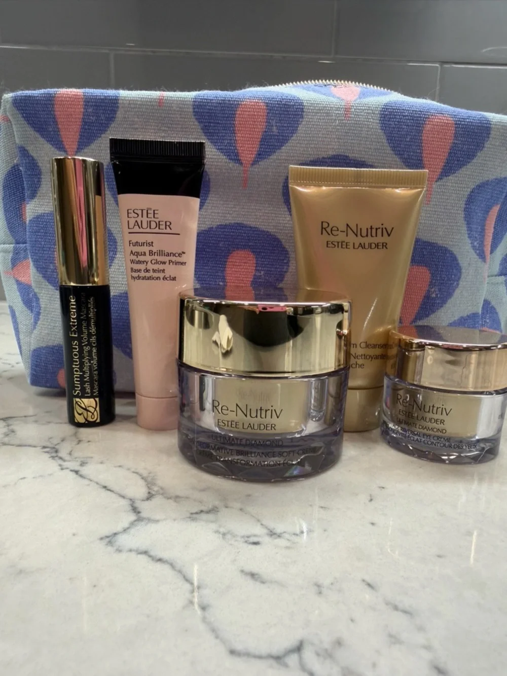 Estee Lauder Skincare Set in Purple and Gold with Pink Primer - Picture 1 of 3